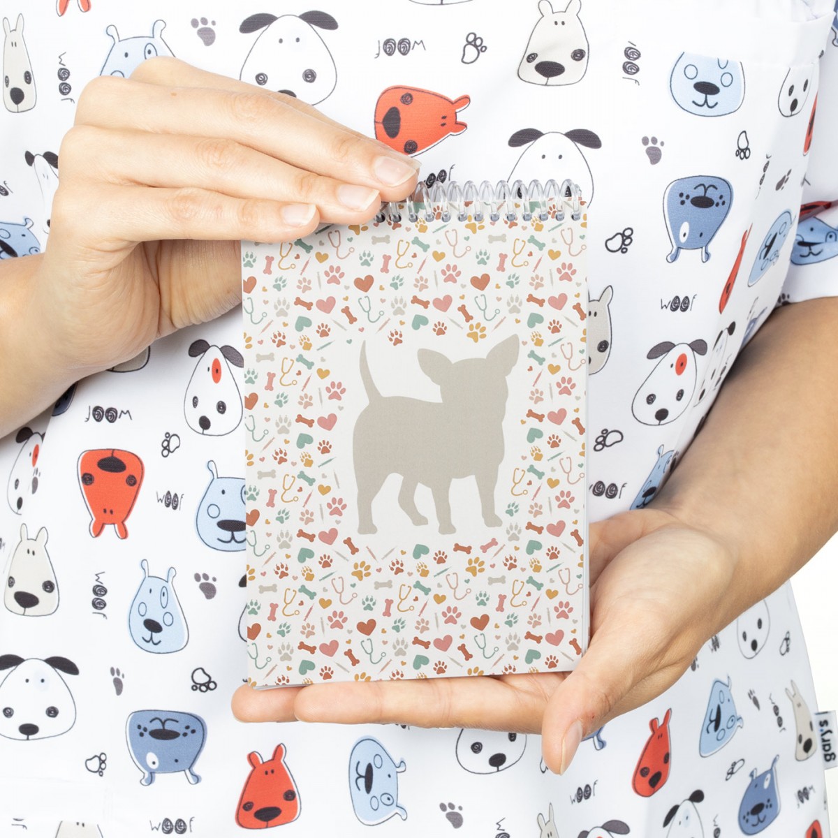 Cute notepad with a dog silhouette, featuring a colorful paw print design, ideal for nurses and healthcare workers.