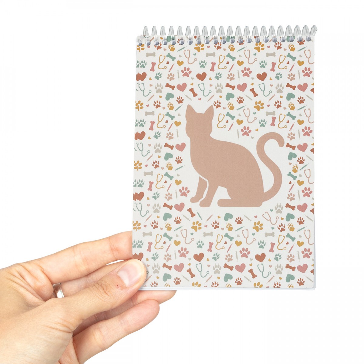 Spiral notebook with a cat design, featuring colorful paw prints, ideal for nurses and healthcare professionals.