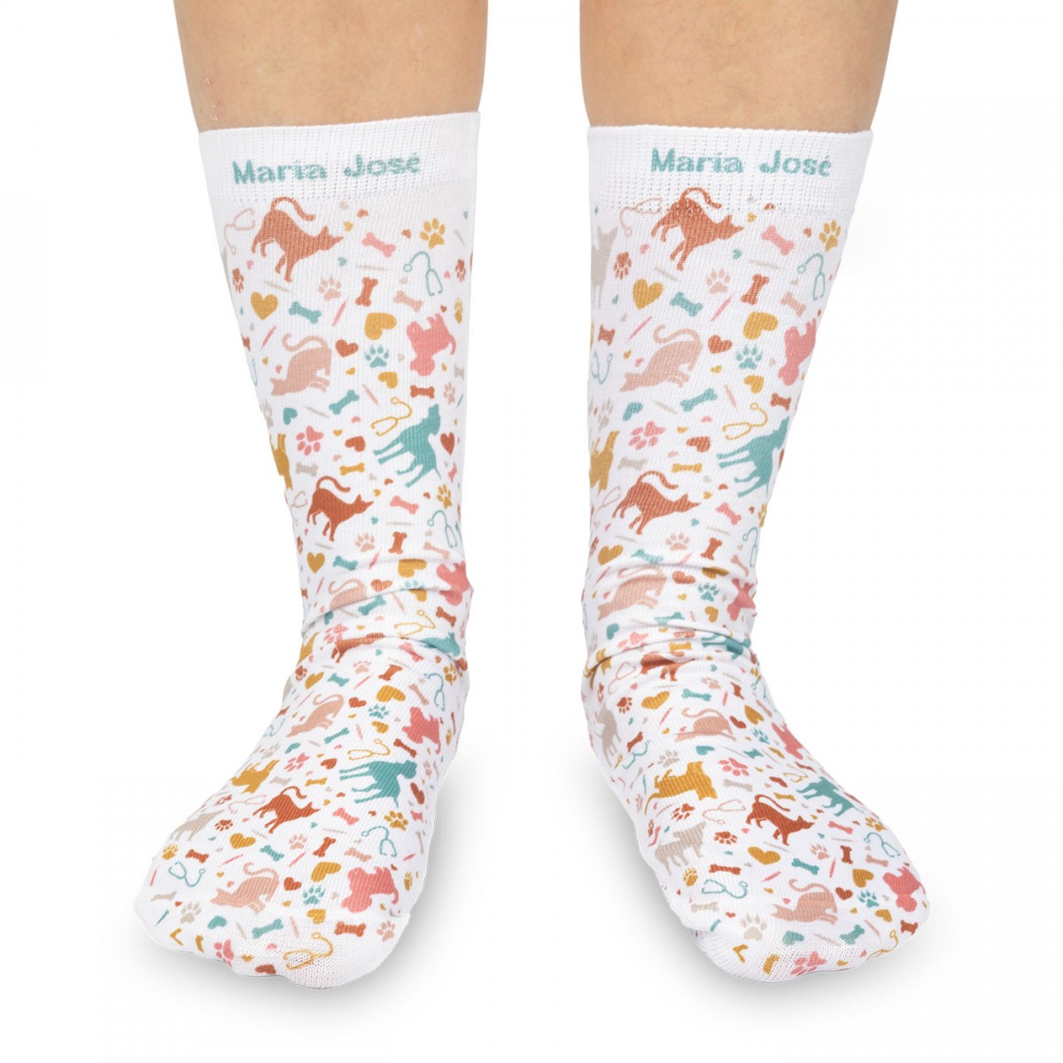 Colorful animal-patterned socks for nurses, featuring a white base and ideal for long shifts.