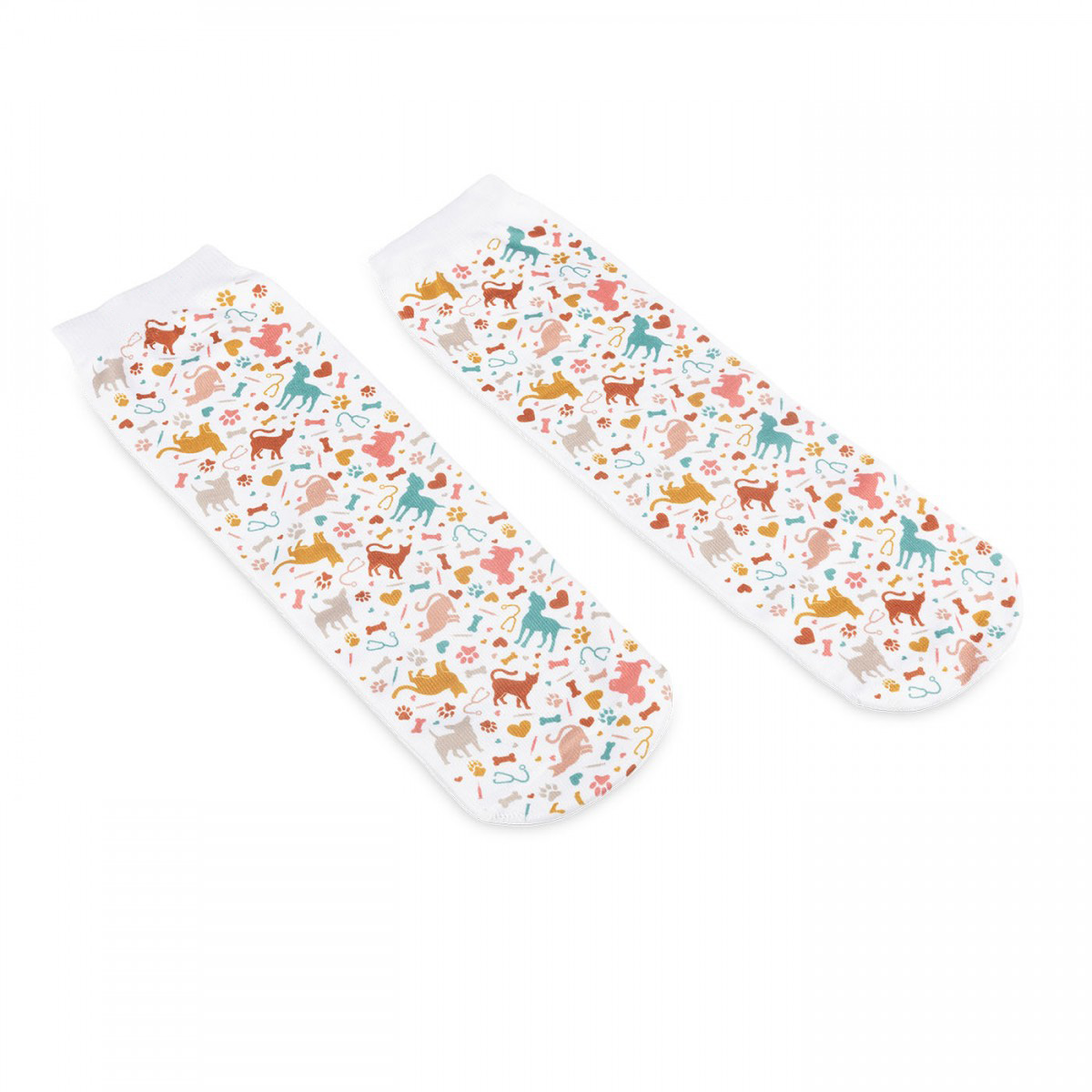 White socks with a colorful pattern of cats and medical icons, designed for nurses and veterinarians to wear during long clinical shifts.